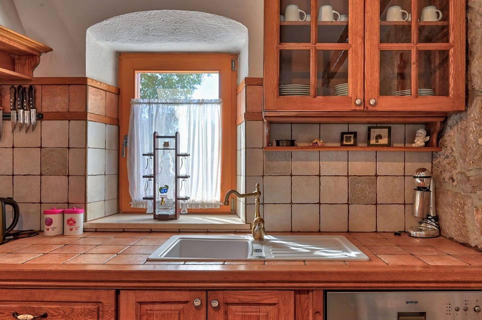 Villa | Private kitchen | Fridge, microwave, oven, stovetop