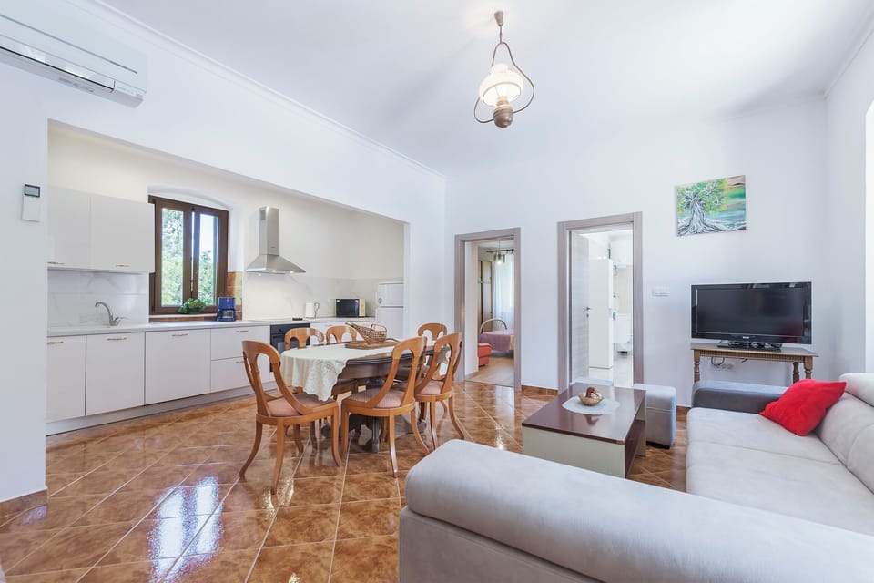Villa | Private kitchen | Fridge, microwave, oven, stovetop