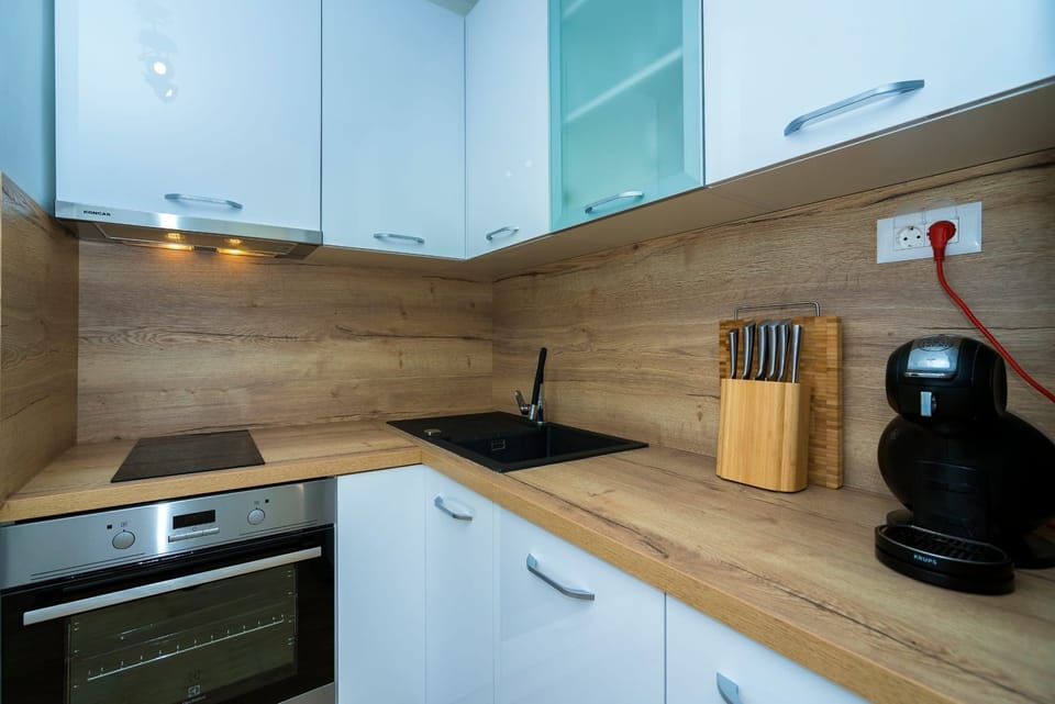 Villa | Private kitchen | Fridge, microwave, oven, stovetop