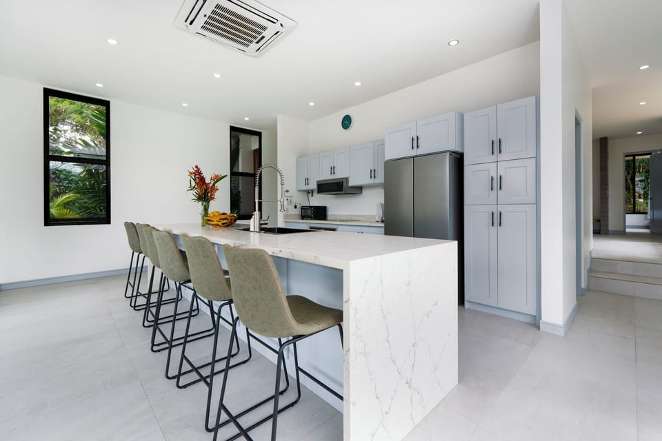 High-end kitchen with generous counters and all cooking essentials.