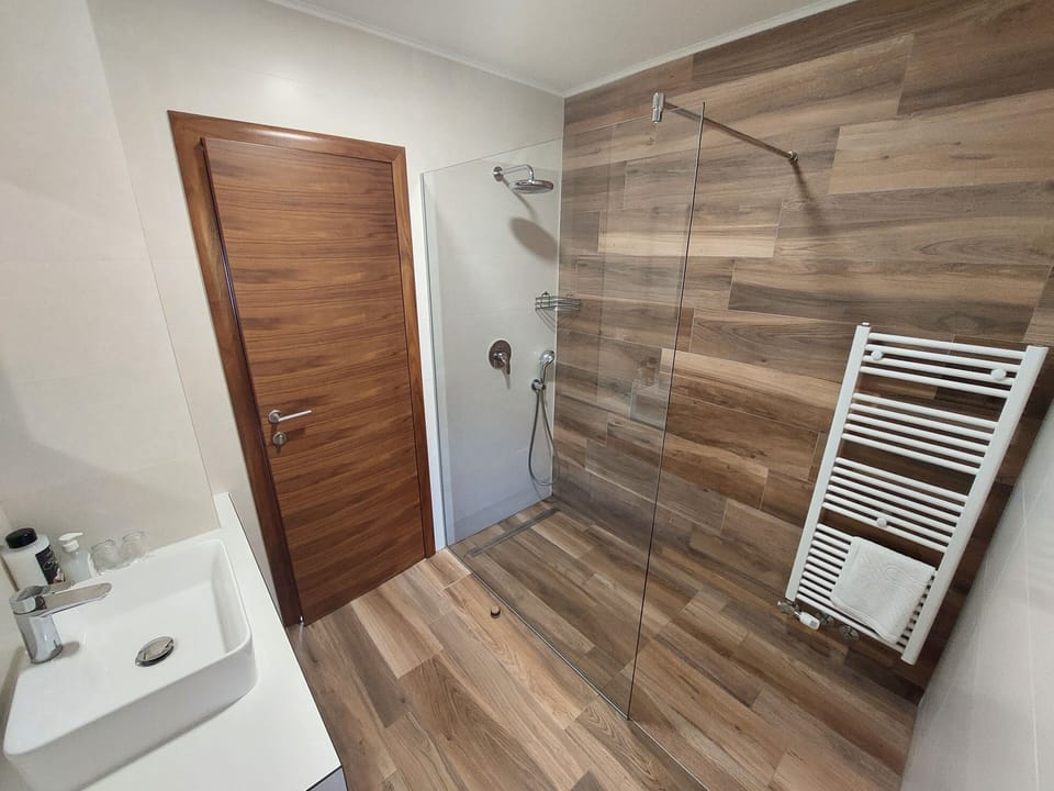 Shower, free toiletries, hair dryer, bathrobes