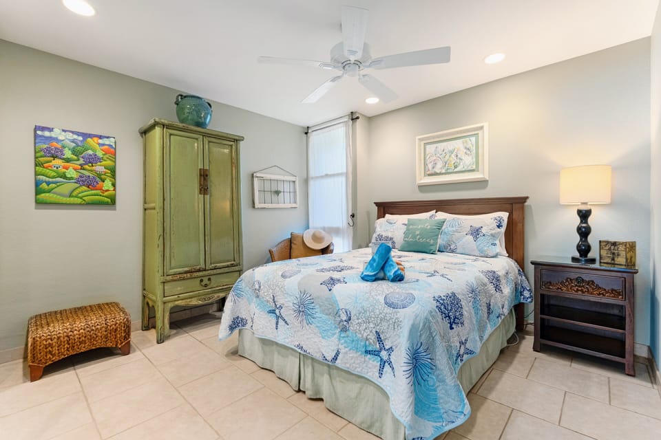 Queen bed downstairs.