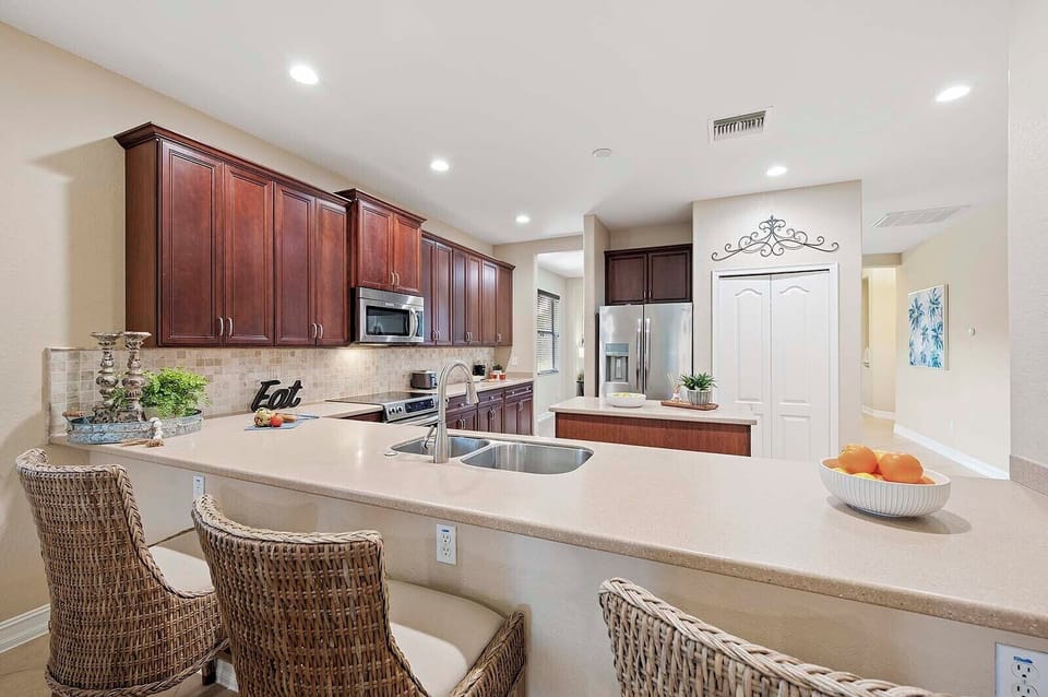 Open Kitchen with View of Dining Area, Living Room and Lanai