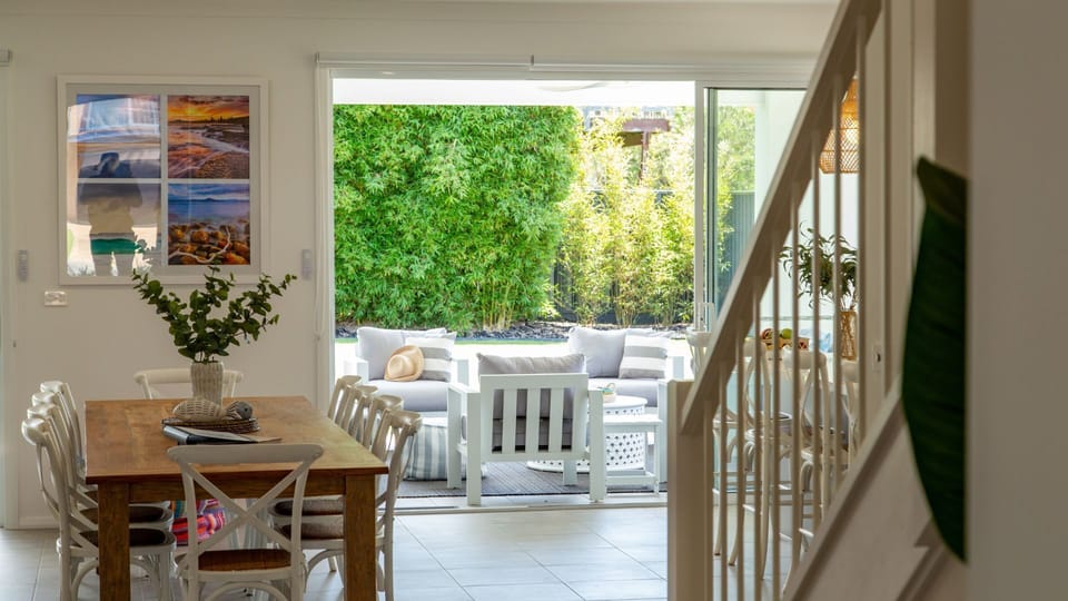 Hamptons Hideaway | Covered outdoor patio | Comfortable outdoor lounge | Garden area