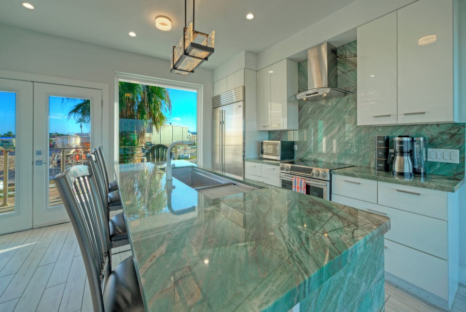 Fully stocked kitchen with ample counter space.