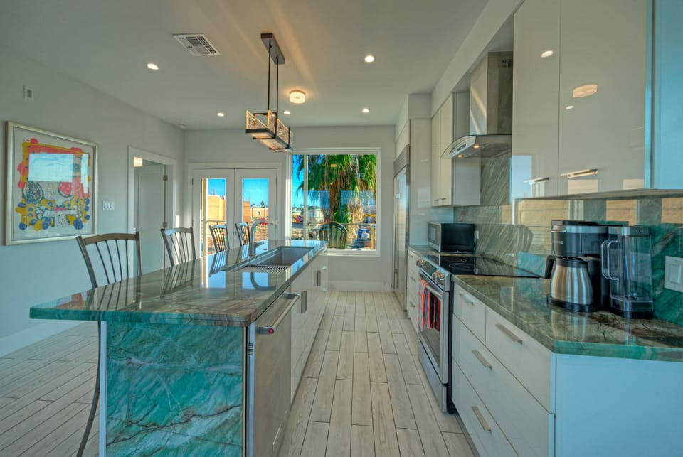 Fully stocked kitchen with reliable appliances and utensils.