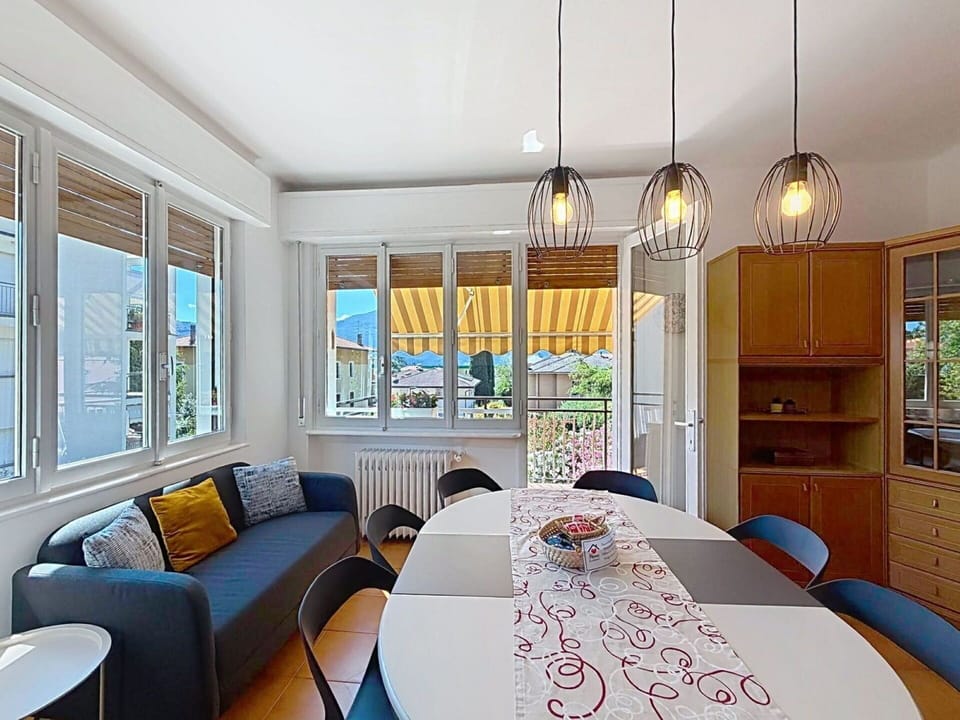 Furniture, Interior Design, Flooring, Wood, Ceiling, Light Fixture, Floor, Room, Lighting, Table