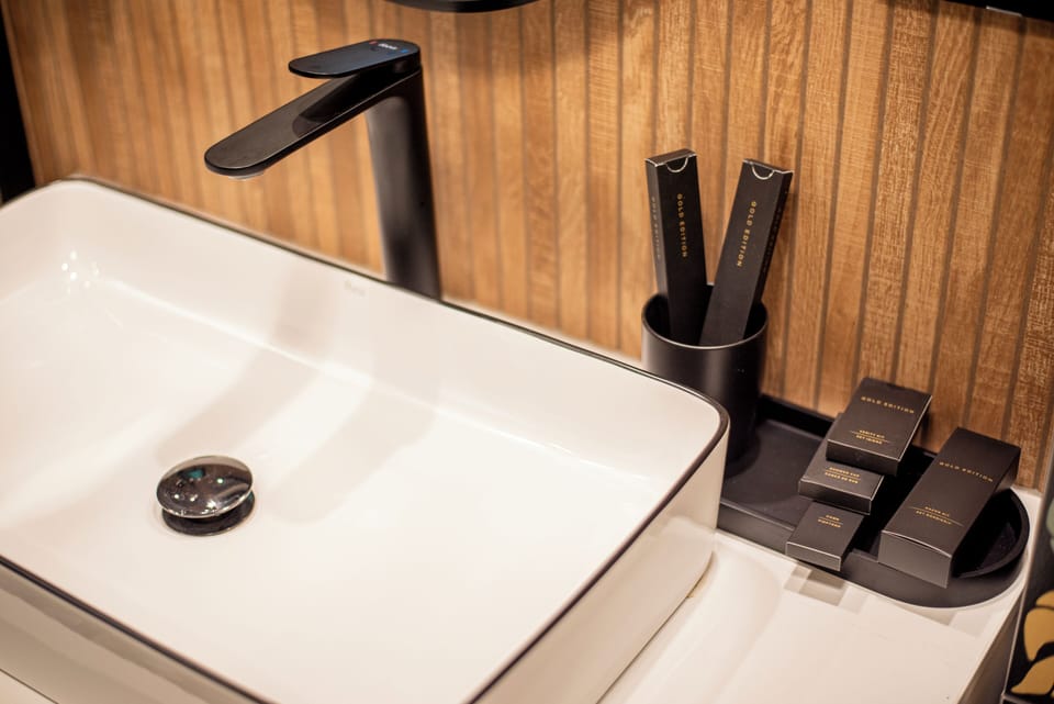 Hair dryer, bathrobes, slippers, towels