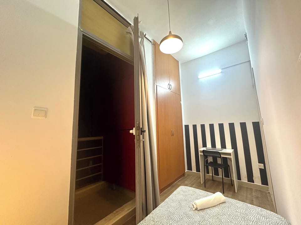 Economy Single Room, Balcony, City View | Iron/ironing board, free WiFi