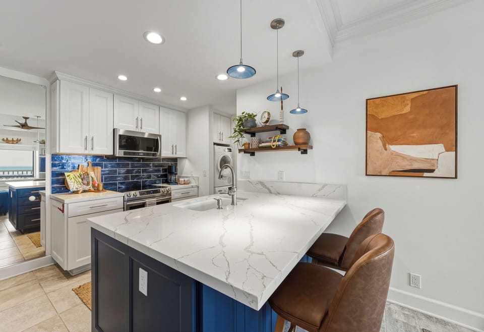 Full kitchen with stainless steel appliances