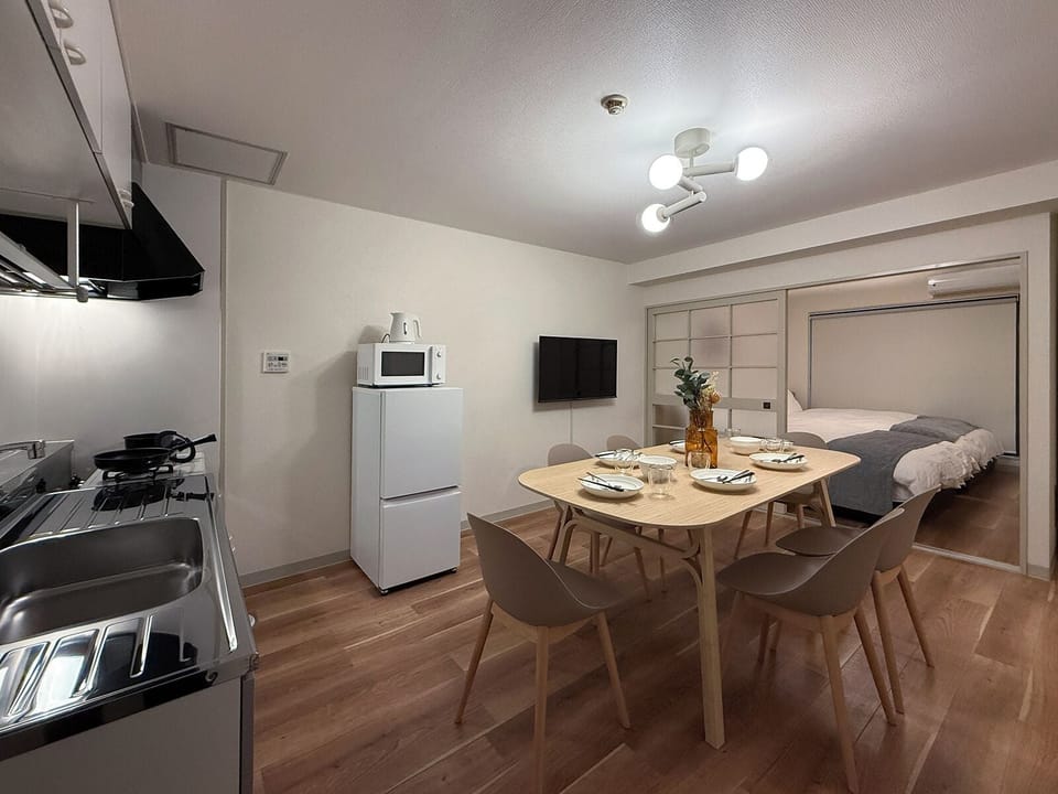 Superior Apartment | Living area | 55-inch Smart TV with cable channels