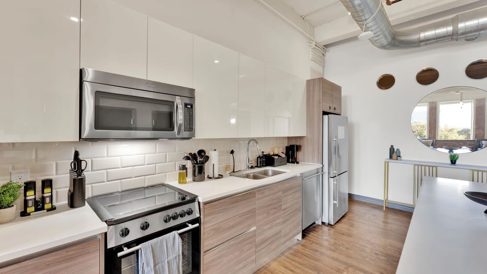 Bright, modern kitchen with sleek finishes and an easy open-loft flow.