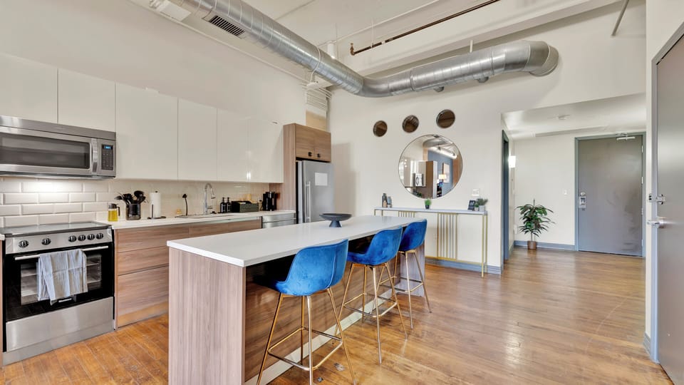 Large kitchen island ideal for gathering and casual meals