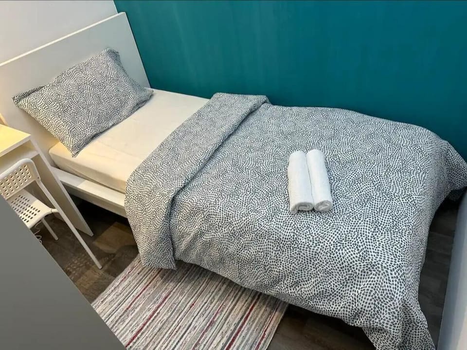 Economy Single Room, Balcony, City View | Iron/ironing board, free WiFi