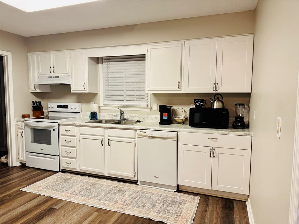 Spacious Kitchen with Keurig coffee maker, CrockPot, blender, toasterm air fryer and more. 