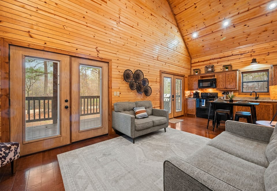The open-concept design connects the living room, kitchen, and dining area for easy gathering and flow.