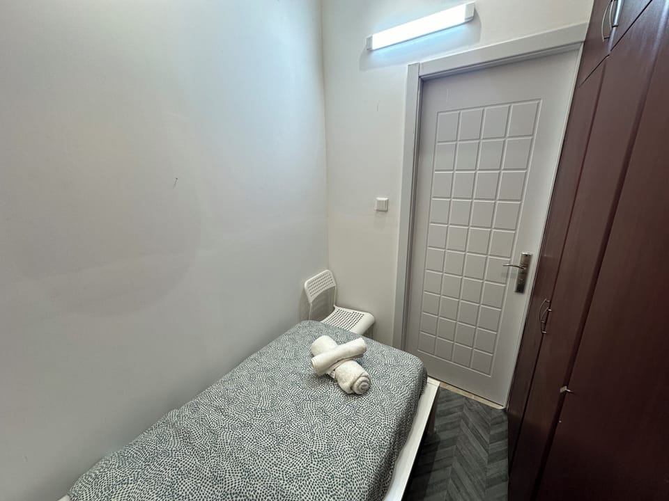 Economy Single Room, Balcony, City View | Iron/ironing board, free WiFi