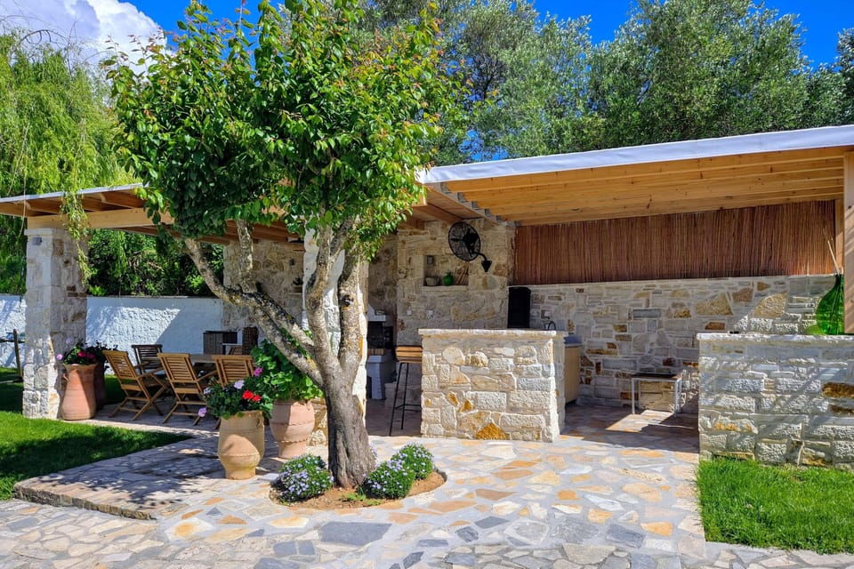 Easy-access BBQ area set in the garden, ideal for family and group gatherings