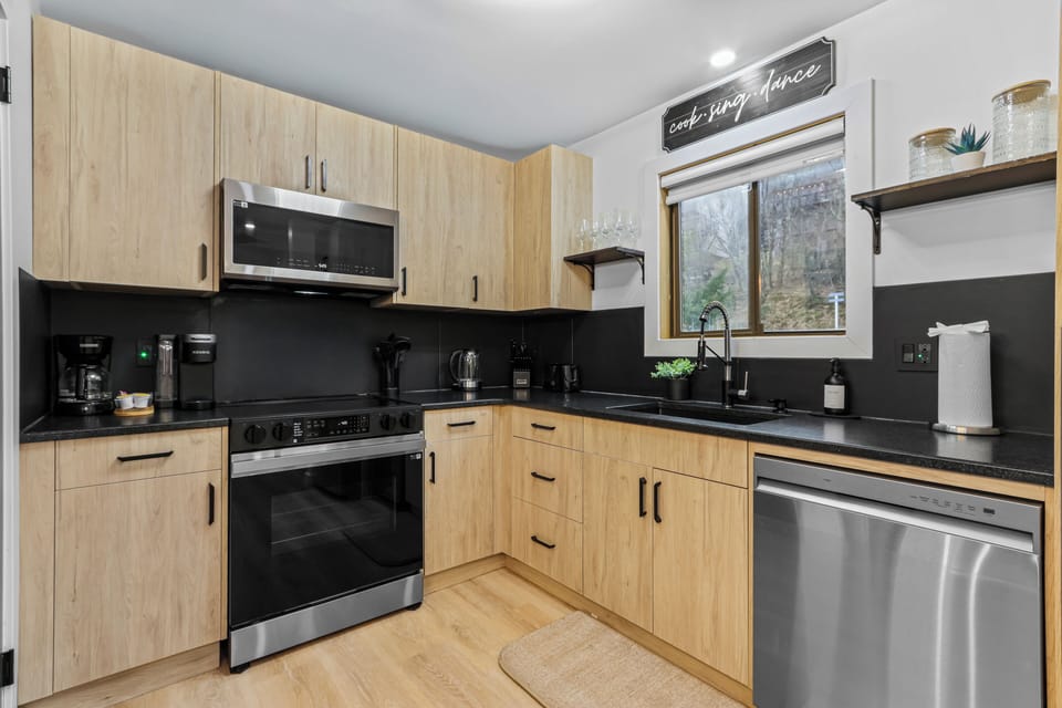Cook up a storm in our fully equipped, renovated kitchen! Features modern stainless-steel appliances, a dishwasher, and a dual coffee station with both Keurig and drip makers. Everything your family needs for easy meal prep in the Poconos.