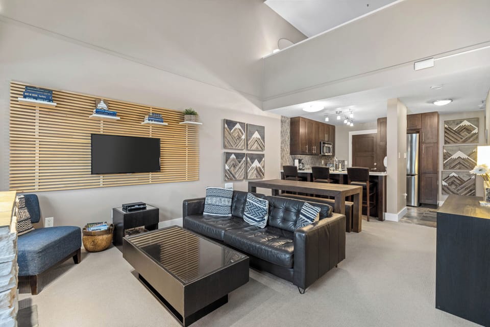 Living room, dining room and kitchen.Loft above.
