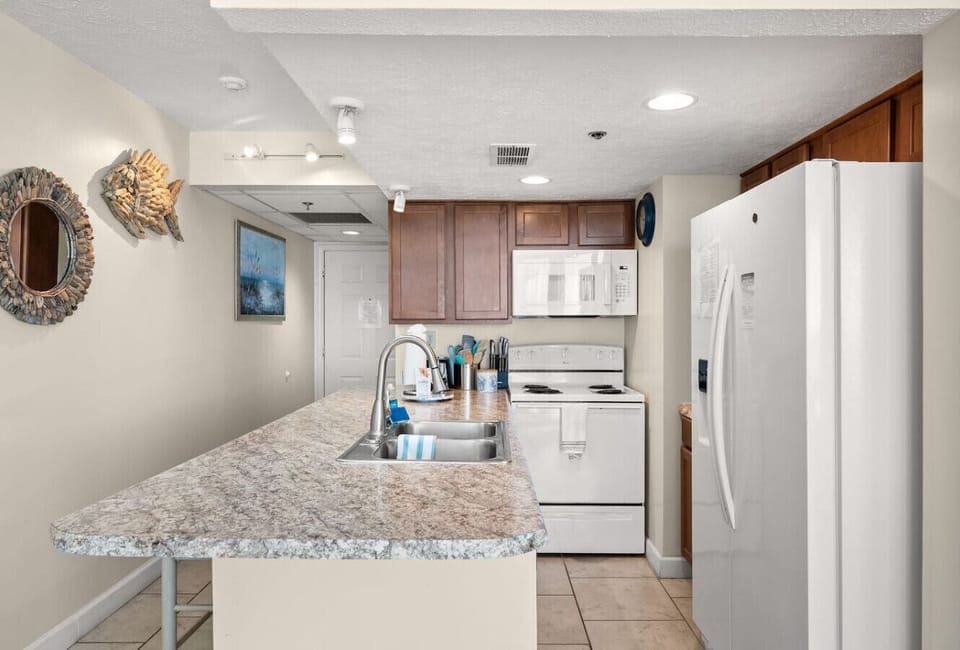 Open-concept kitchen and dining area designed for comfort and convenience during your stay.