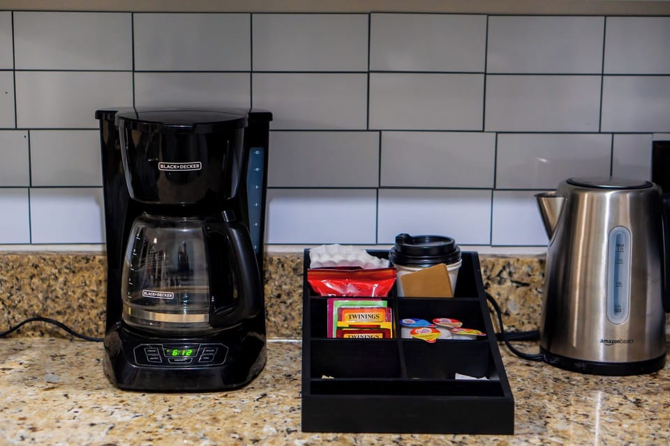 drip coffee maker provided for guests in the kitchen