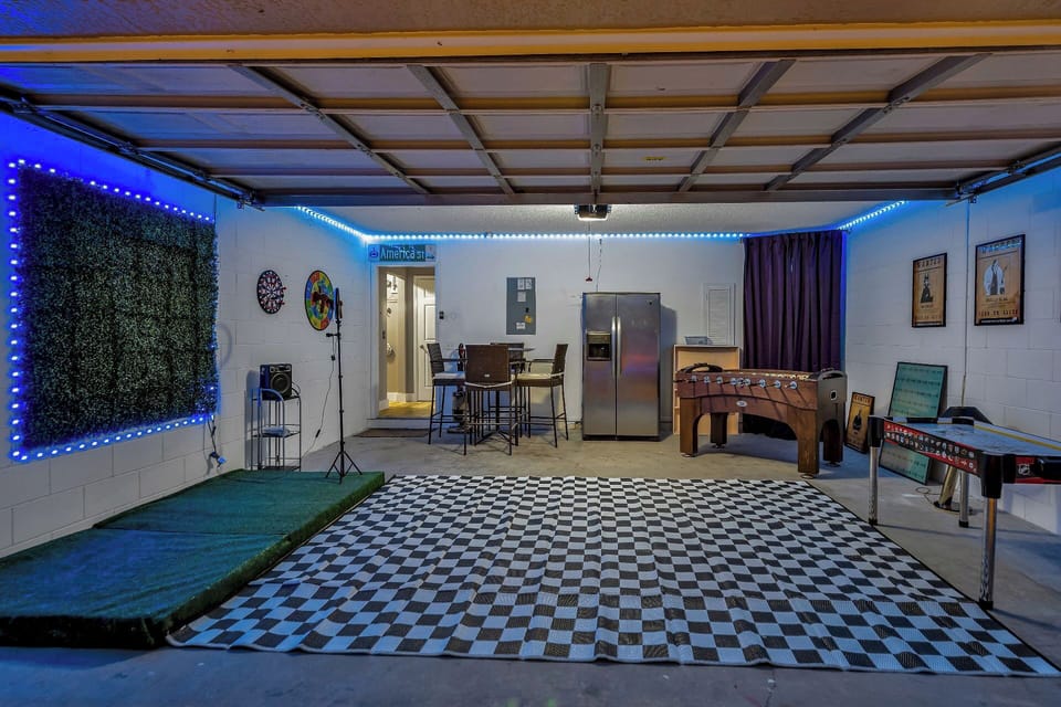Disney Villains–themed game room with karaoke, foosball, and air hockey