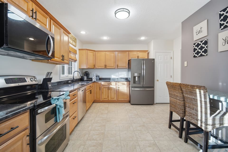 Fully equipped kitchen for cooking meals at home.