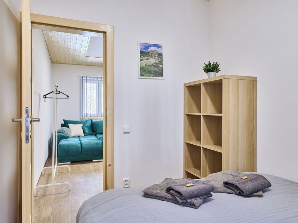 Furniture, Interior Design, Flooring, Floor, Wall, Bed, Bedroom, Wood, Room, Ceiling