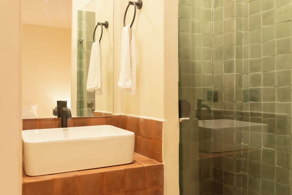 Shower, towels, soap, shampoo