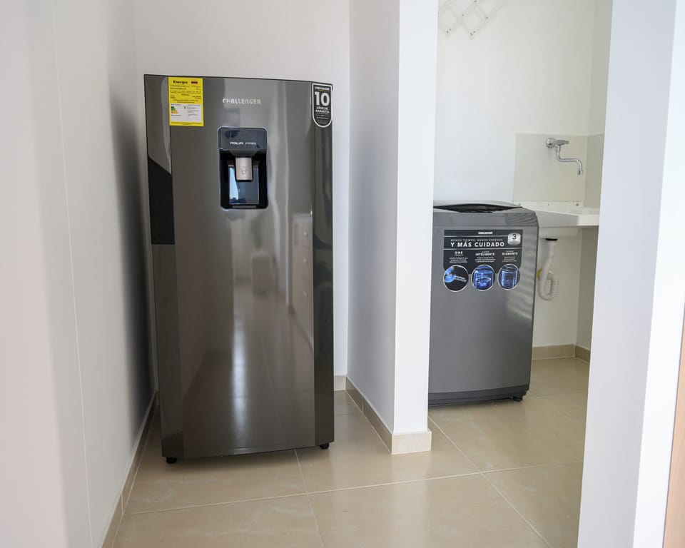 Refrigerator located by laundry area (washing machine)