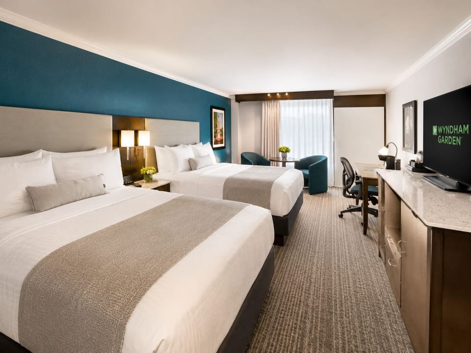 Room, 2 Double Beds, Non Smoking | Premium bedding, in-room safe, desk, iron/ironing board