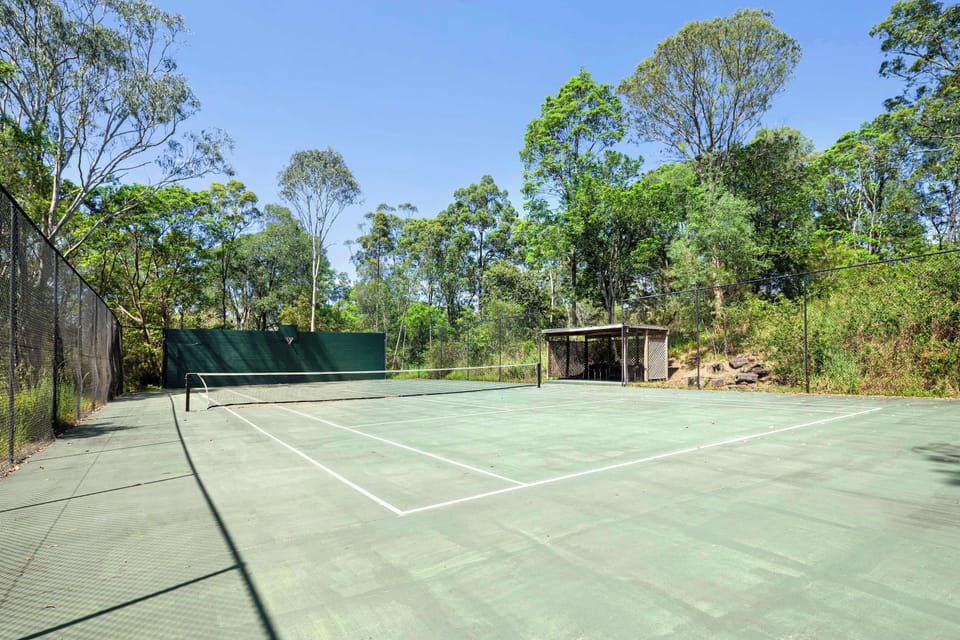 Tennis court - Tennis, Pickle ball, a few baskets.
