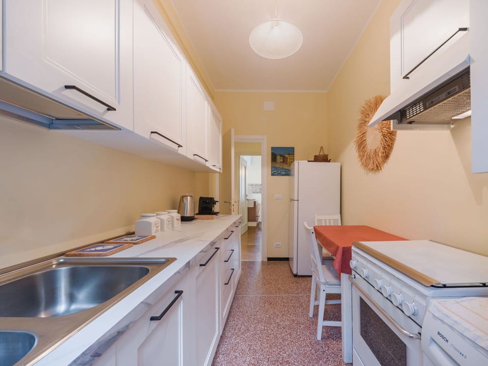 Flooring, Interior Design, Floor, Countertop, Kitchen, Major Appliance, Ceiling, Kitchen Appliance, Room, Furniture