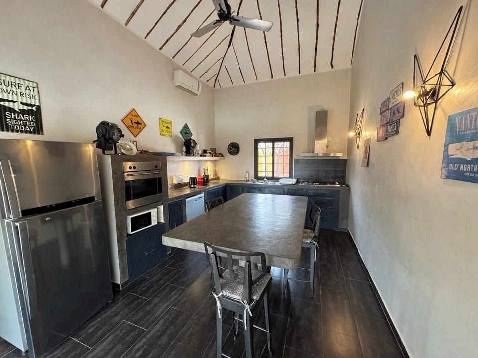 Superior Villa, Patio, Pool View | Private kitchen