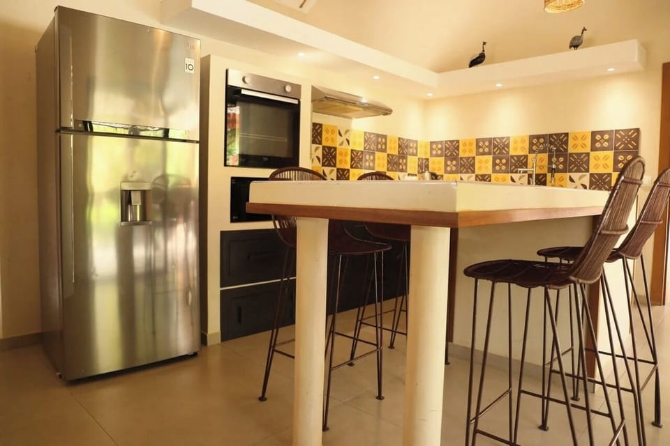 Deluxe Villa, Pool View | Private kitchen