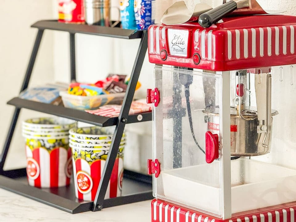 Enjoy a fun movie-night experience with the on-site popcorn machine and snack station, perfect for family time and cozy evenings.