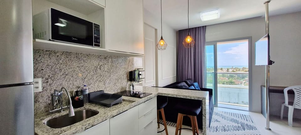 Basic Apartment | Private kitchen | Fridge, microwave, stovetop, blender