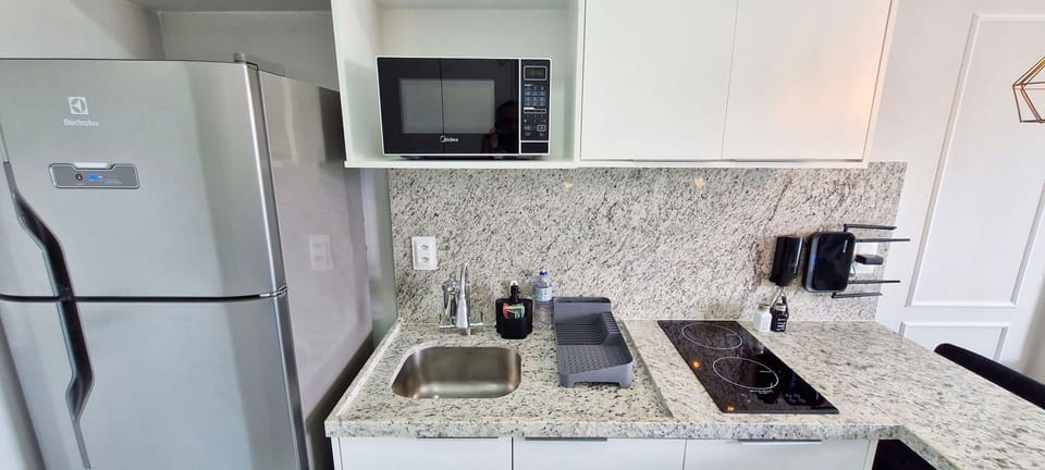 Basic Apartment | Private kitchen | Fridge, microwave, stovetop, blender