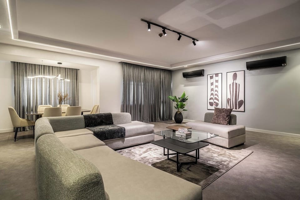 Economy Apartment, Balcony, City View | Living area | Flat-screen TV