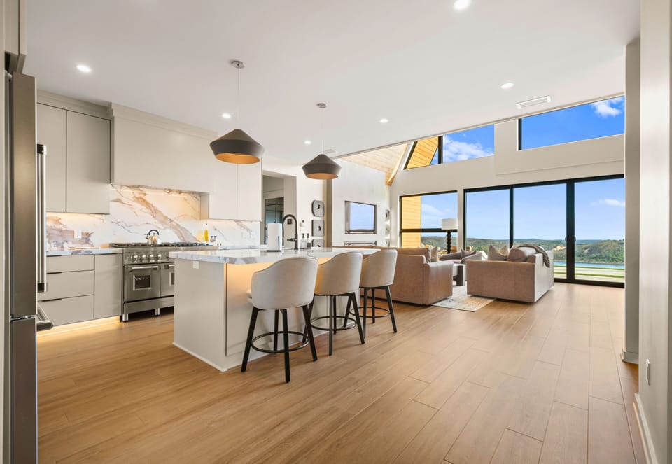 This kitchen feels light, airy, and modern, with a clean layout that makes cooking together easy—whether you're making breakfast or putting together a full dinner spread.
