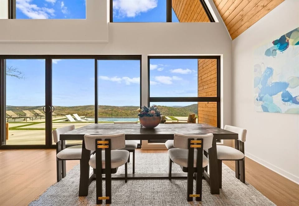 Enjoy gathering around this table with plenty of space for everyone, plus a view outside that makes even a simple meal feel a little more memorable.