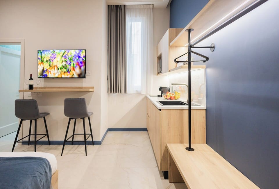 Standard Double Room | Blackout drapes, iron/ironing board, free WiFi, bed sheets