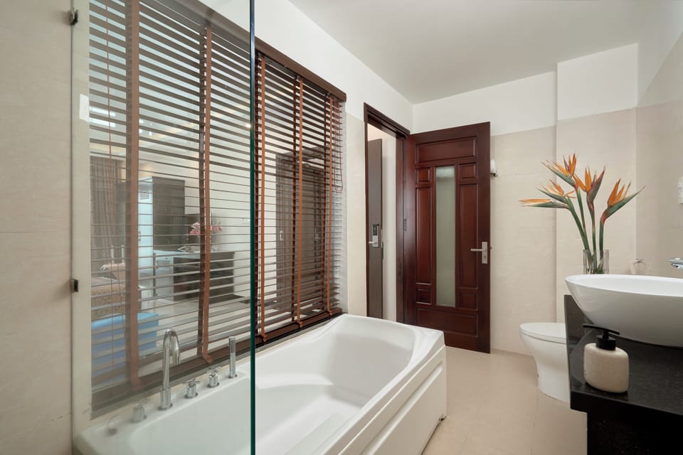 Combined shower/tub, free toiletries, hair dryer, slippers
