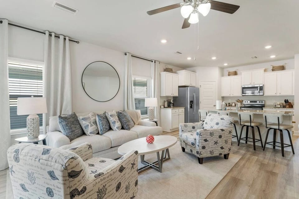 Main living: an open living space designed for connection, flowing seamlessly into the dining area.