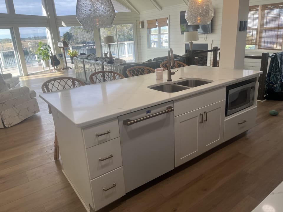 The kitchen facing large living area second floor