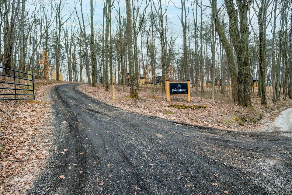 Main entrance to Notestone Reserve — gravel drive leading into the 14-acre property in Laurelville, Ohio