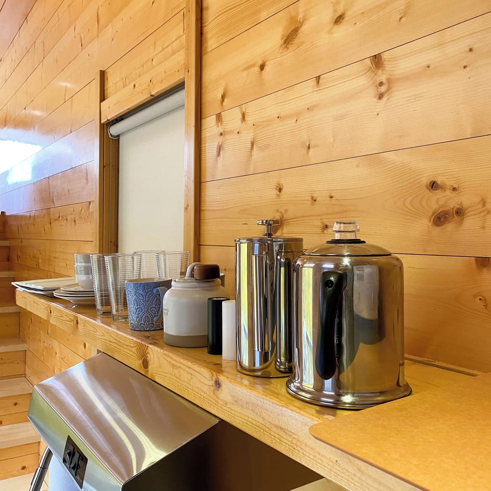 Shelf in kitchen with kitchenware