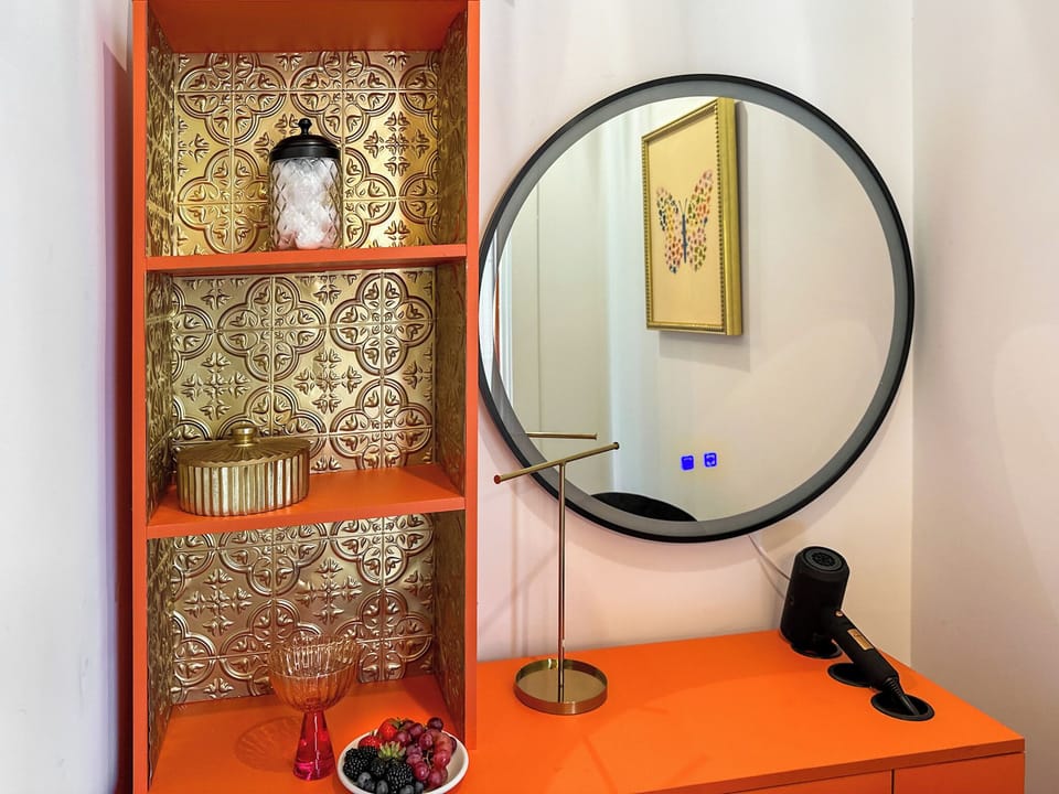 Bedroom 2 – Second Floor: Queen bedroom with vanity.