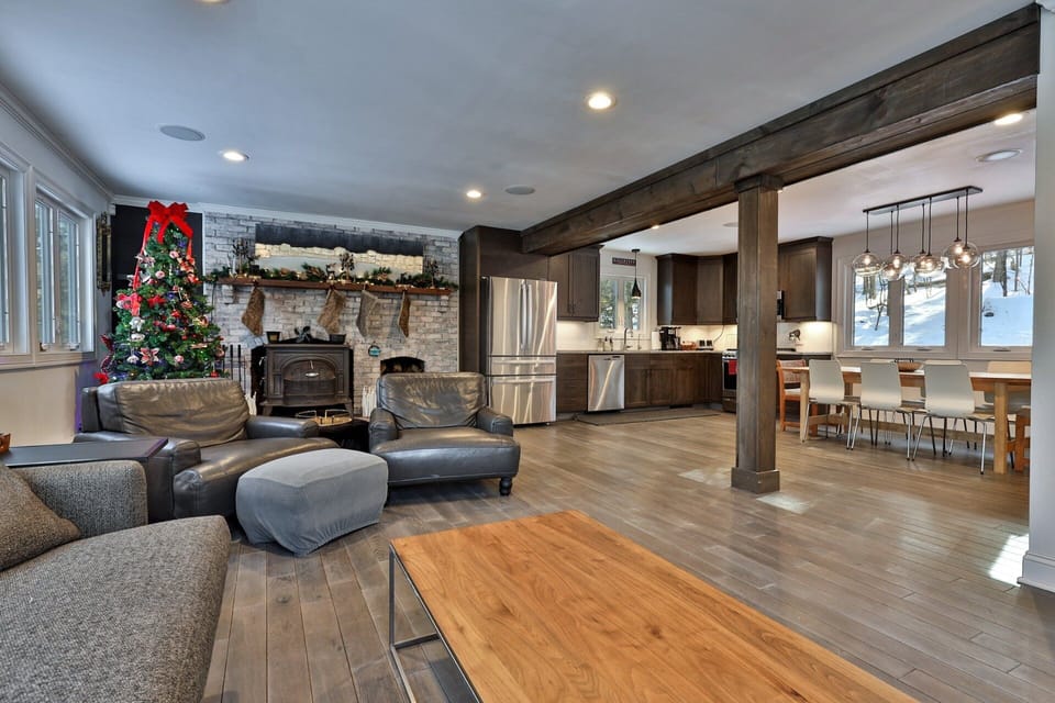 The living room flows straight into the kitchen and dining area, so the group can spend time together between meals.
